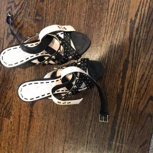 Rachel Roy studded black wedge sandals.